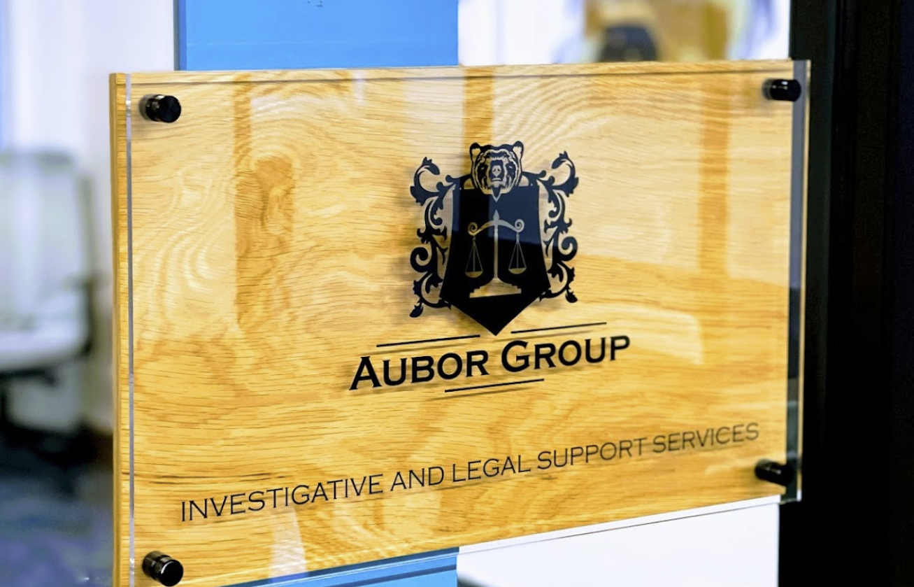logo by door to aubor group investigative and legal support services